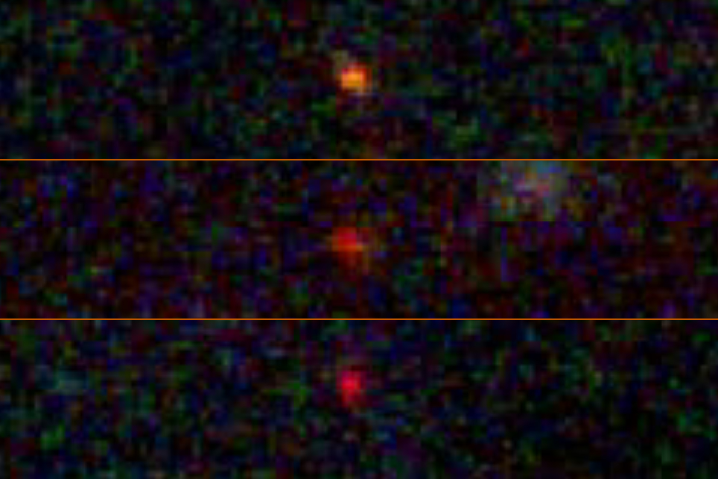 Three blurry red dots stand out in the blackness of space